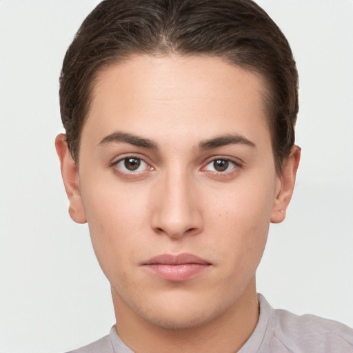 Neutral white young-adult male with short  brown hair and brown eyes