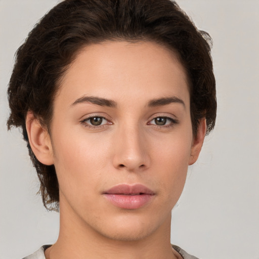 Neutral white young-adult female with short  brown hair and brown eyes