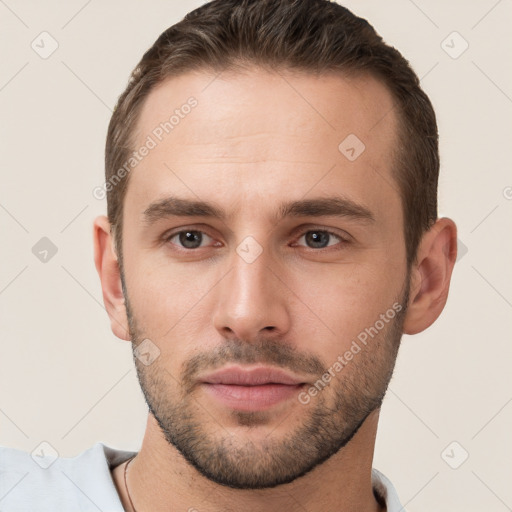 Neutral white young-adult male with short  brown hair and brown eyes