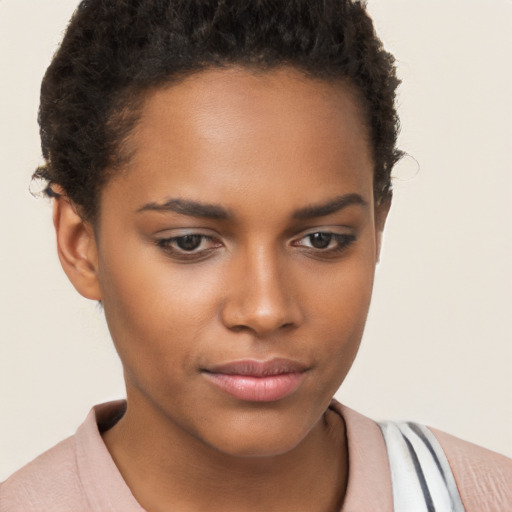 Neutral black young-adult female with short  brown hair and brown eyes