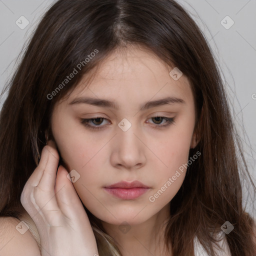 Neutral white young-adult female with long  brown hair and brown eyes