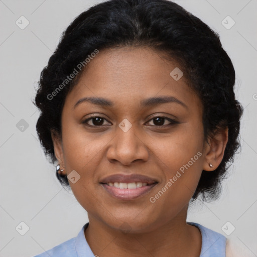 Joyful black young-adult female with medium  brown hair and brown eyes