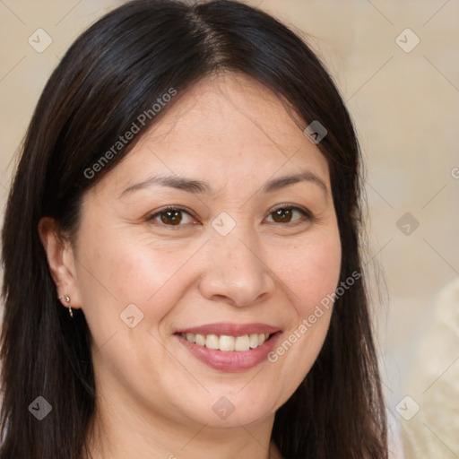 Joyful white adult female with long  brown hair and brown eyes