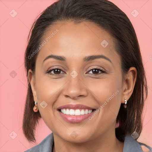 Joyful white young-adult female with long  brown hair and brown eyes