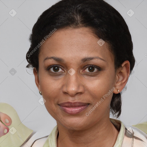 Joyful latino adult female with short  brown hair and brown eyes