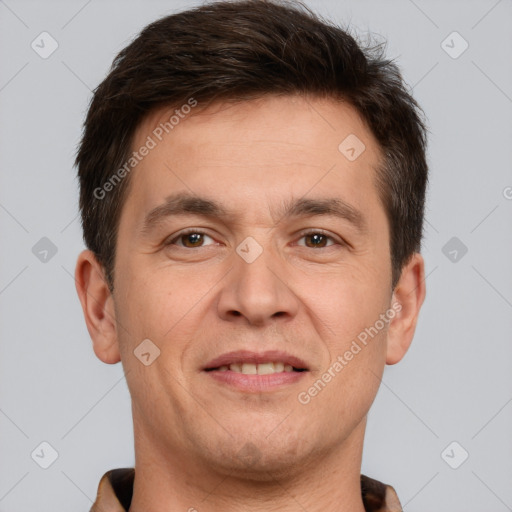 Joyful white adult male with short  brown hair and brown eyes