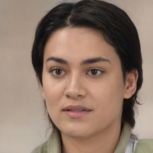 Joyful white young-adult female with medium  brown hair and brown eyes