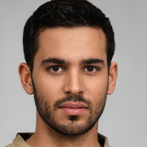 Neutral white young-adult male with short  brown hair and brown eyes