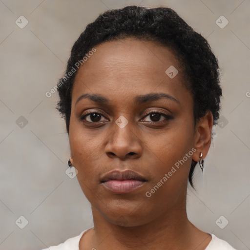 Neutral black young-adult female with short  black hair and brown eyes