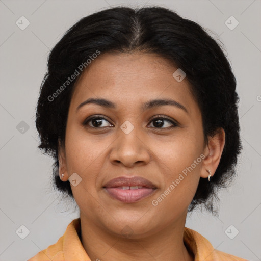 Joyful latino adult female with medium  brown hair and brown eyes