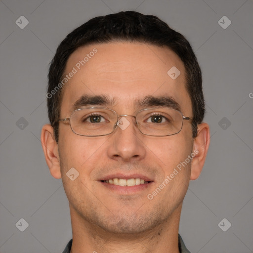 Joyful white adult male with short  brown hair and brown eyes