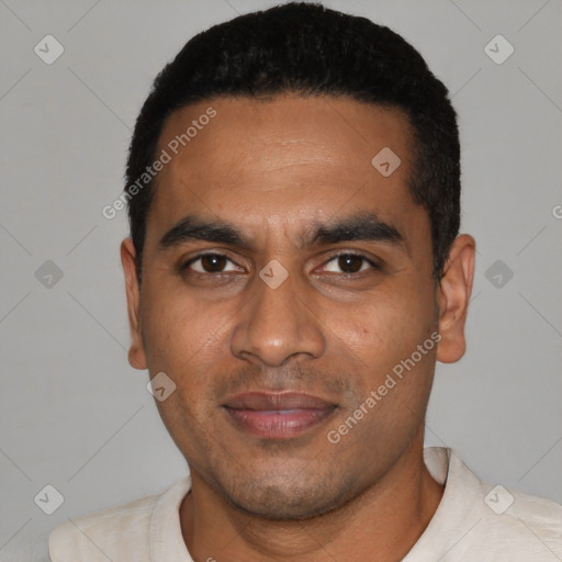 Joyful latino young-adult male with short  black hair and brown eyes