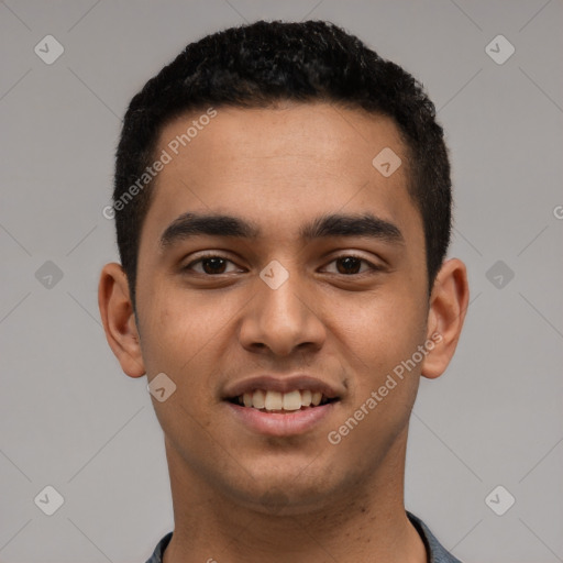 Joyful latino young-adult male with short  black hair and brown eyes