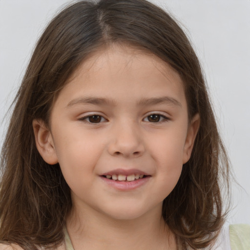 Joyful white child female with medium  brown hair and brown eyes