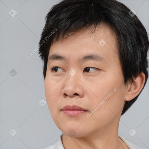 Neutral asian young-adult male with short  black hair and brown eyes