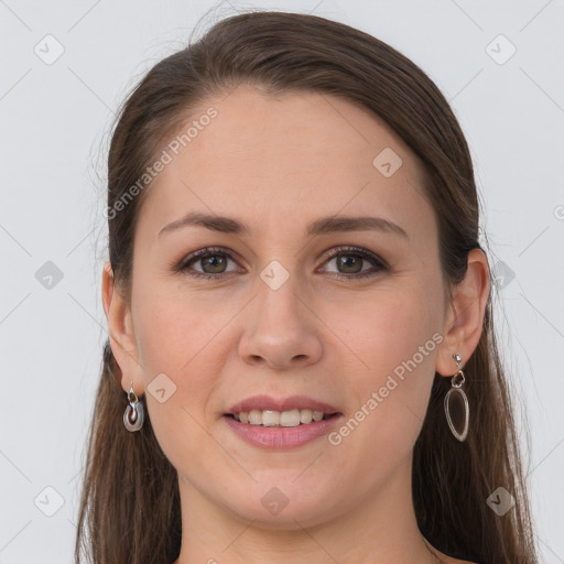 Joyful white young-adult female with long  brown hair and grey eyes