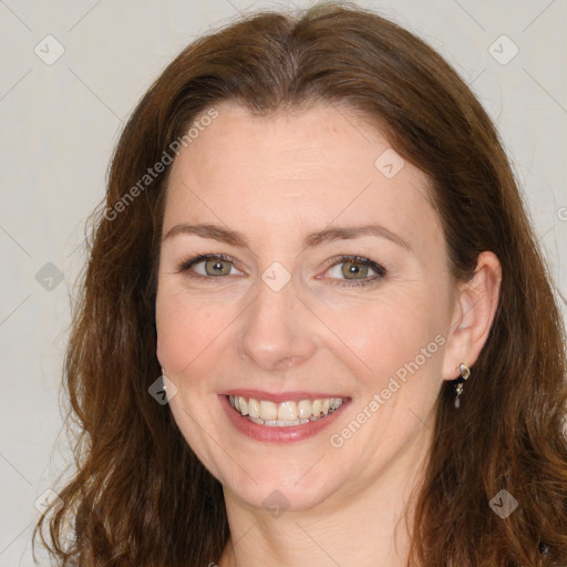 Joyful white young-adult female with medium  brown hair and green eyes