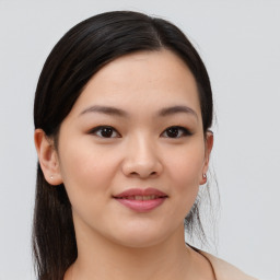 Joyful asian young-adult female with medium  black hair and brown eyes