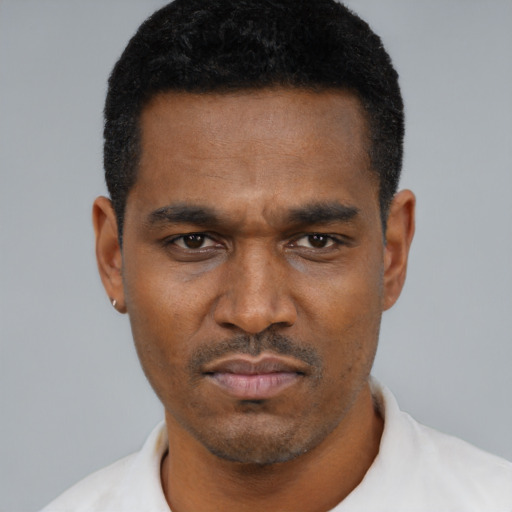Neutral black young-adult male with short  black hair and brown eyes
