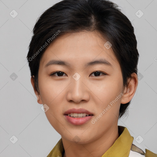 Joyful asian young-adult female with short  brown hair and brown eyes