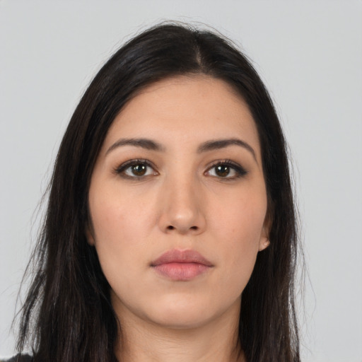 Neutral latino young-adult female with long  brown hair and brown eyes