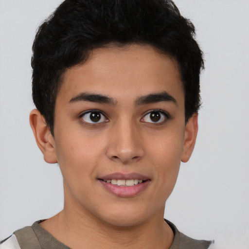 Joyful latino young-adult female with short  brown hair and brown eyes