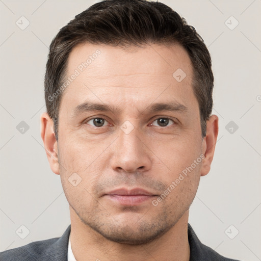 Neutral white adult male with short  brown hair and brown eyes