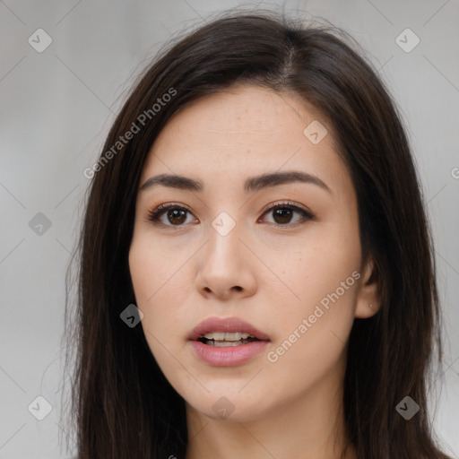 Neutral white young-adult female with long  brown hair and brown eyes