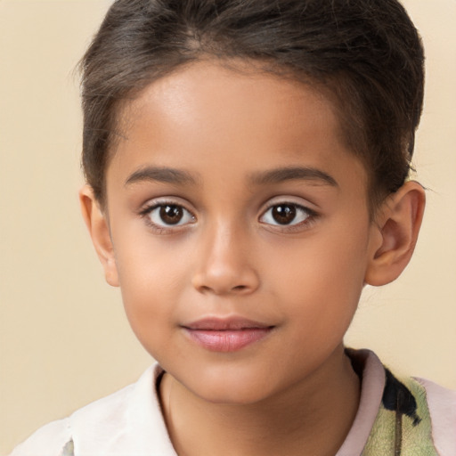 Joyful white child female with short  brown hair and brown eyes