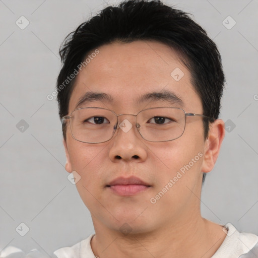 Neutral asian young-adult male with short  brown hair and brown eyes