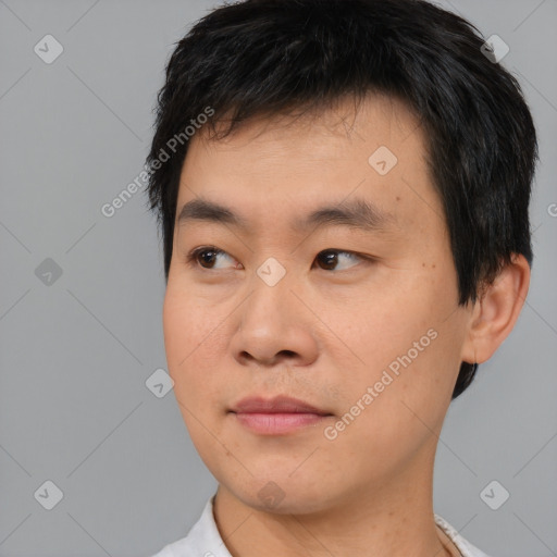 Neutral asian young-adult male with short  black hair and brown eyes