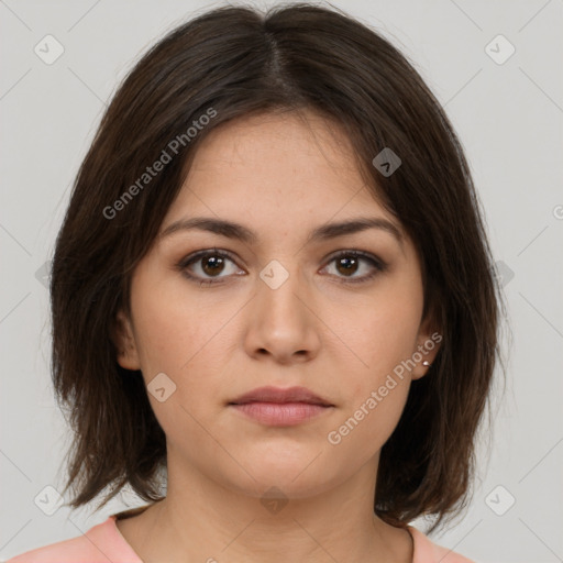 Neutral white young-adult female with medium  brown hair and brown eyes