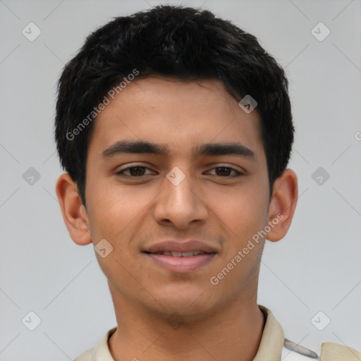 Joyful latino young-adult male with short  brown hair and brown eyes