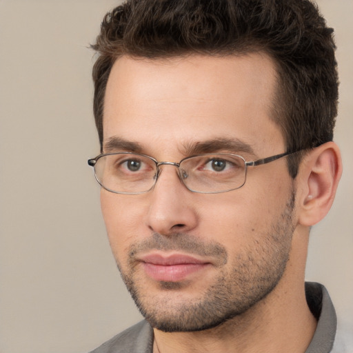 Neutral white young-adult male with short  brown hair and brown eyes