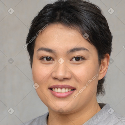 Joyful asian young-adult female with short  brown hair and brown eyes