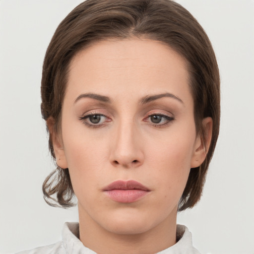 Neutral white young-adult female with medium  brown hair and grey eyes