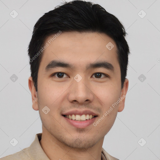 Joyful asian young-adult male with short  black hair and brown eyes