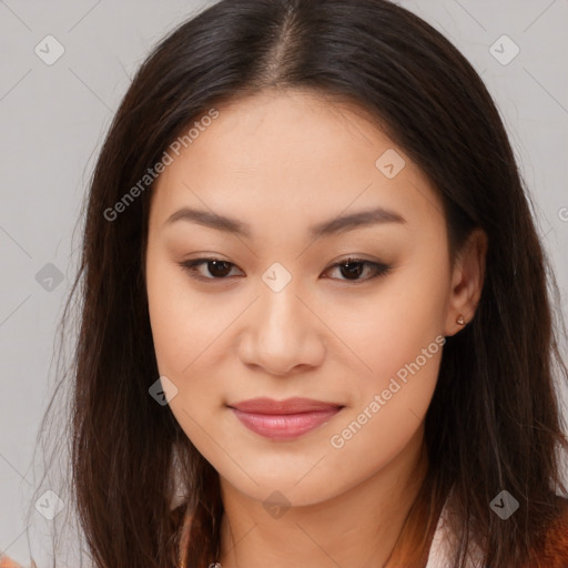 Joyful asian young-adult female with long  brown hair and brown eyes