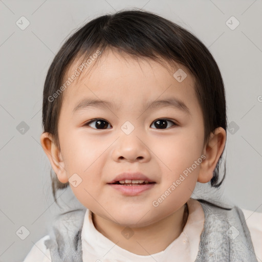 Joyful white child male with short  brown hair and brown eyes