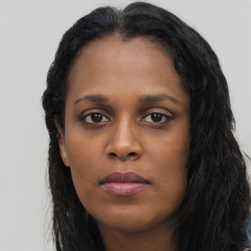 Neutral black young-adult female with long  black hair and brown eyes