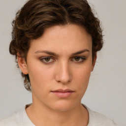 Neutral white young-adult female with short  brown hair and brown eyes