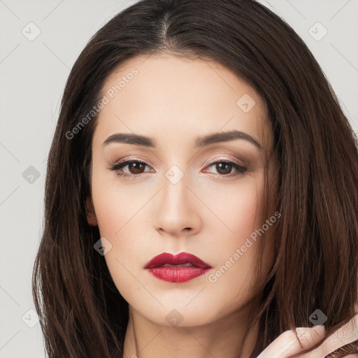 Neutral white young-adult female with long  brown hair and brown eyes