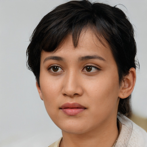 Neutral asian young-adult female with medium  black hair and brown eyes