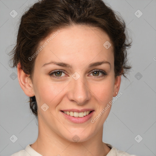 Joyful white young-adult female with medium  brown hair and green eyes