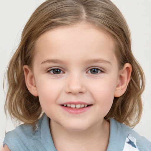 Joyful white child female with medium  brown hair and blue eyes