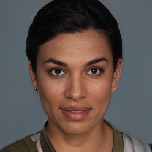 Joyful latino young-adult female with short  brown hair and brown eyes