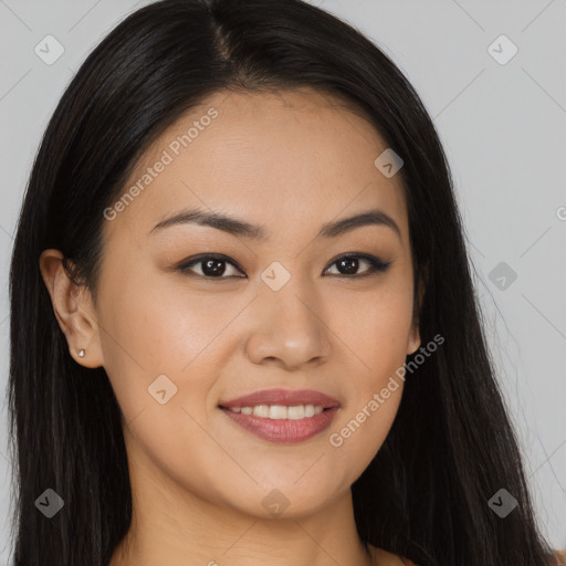 Joyful asian young-adult female with long  brown hair and brown eyes