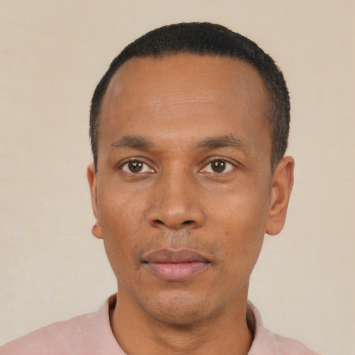 Neutral black adult male with short  black hair and brown eyes