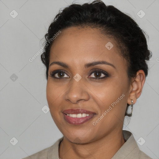 Joyful latino young-adult female with short  brown hair and brown eyes