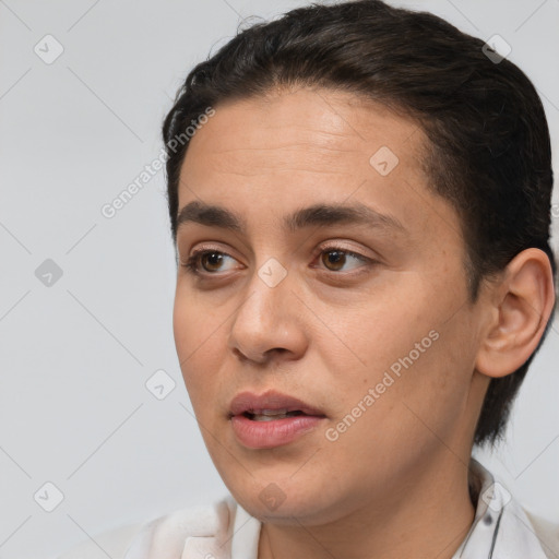 Joyful white young-adult female with short  brown hair and brown eyes